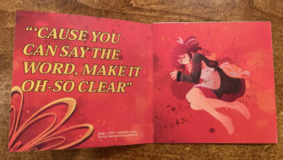 Card half-folded out